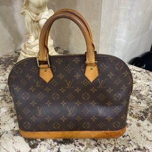 Authentic used LOUIS VUITTON ALMA BAG